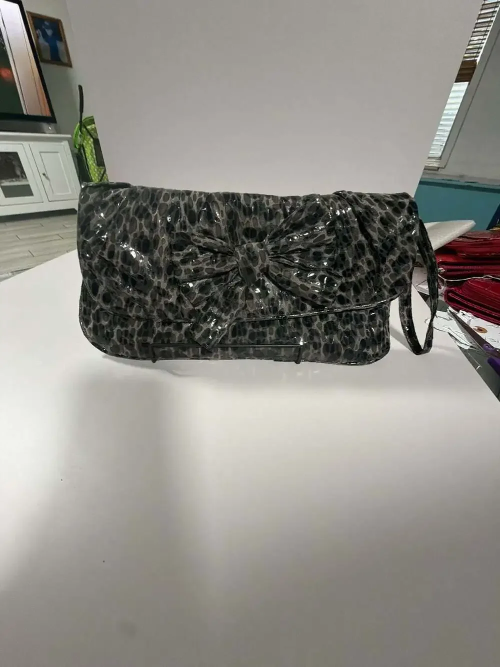 Black Leopard Print Patent Clutch with Bow Detail
